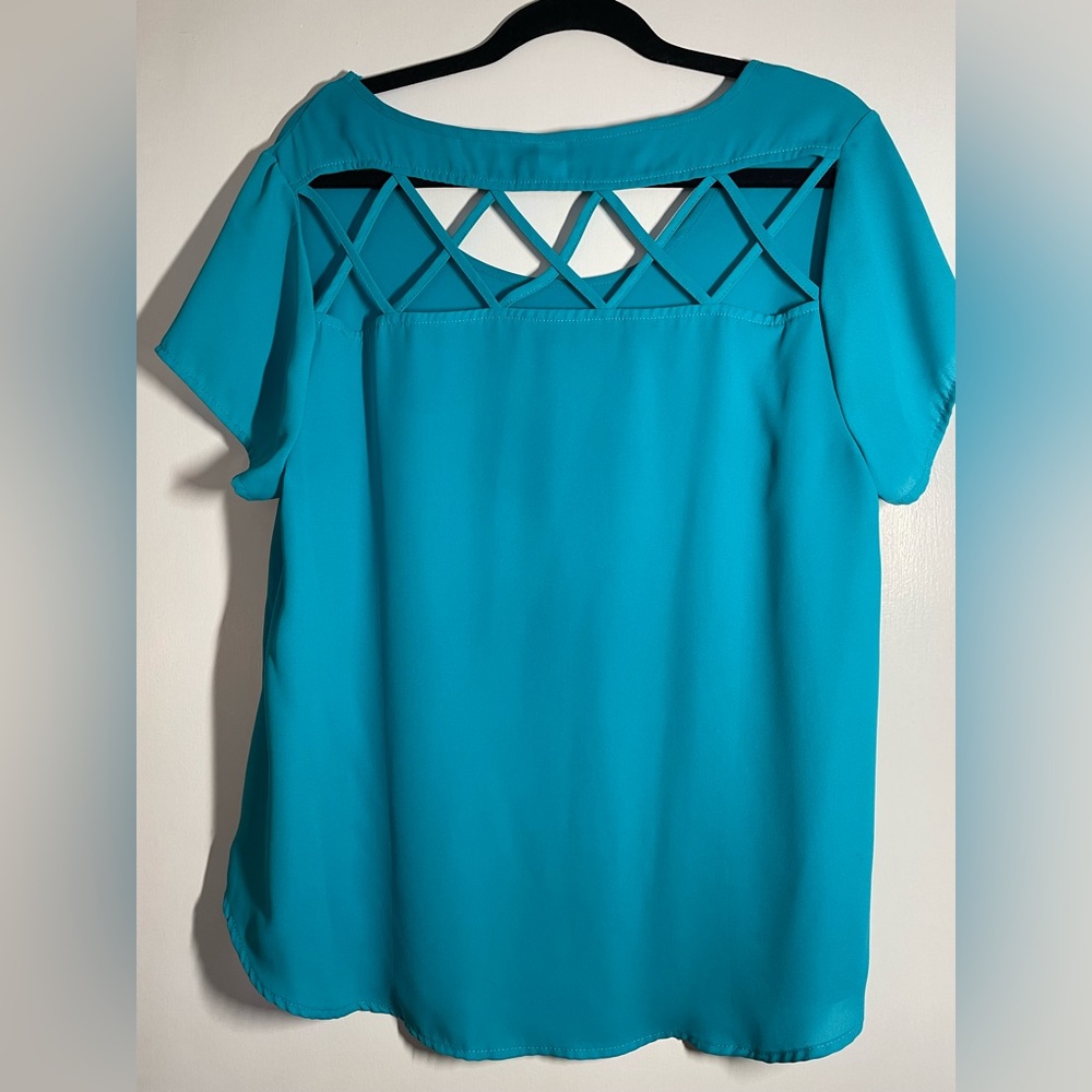 Torrid teal cross back blouse